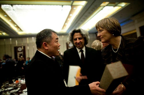 Harvard Graduate School of Design alumnus David Tseng (left), M.AR. '87, greets Harvard President Drew Faust (right) and GSD Dean Mohsen Mostafavi at the opening of the Harvard Center Shanghai. Tseng is a professor and dean of the College of Fine Arts and Creative Design, Tunghai University, Taiwan. Professor and Dean, College of Fine Arts and Creative Design, Tunghai University, Taiwan, ROC.)