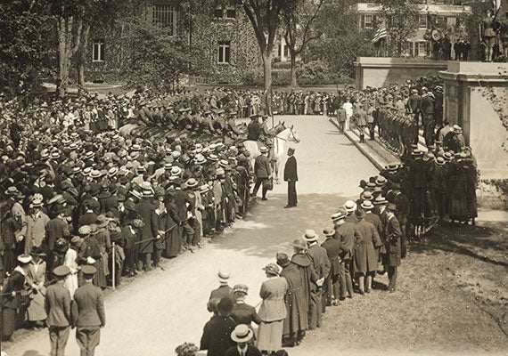 Gen. John J. “Black Jack” Pershing, who led the American Expeditionary Forces, visited Widener Library on May 30, 1920 — Memorial Day — to view the Roll of Honor, the collected photos of Harvard’s war dead. Courtesy of Harvard University Archives
