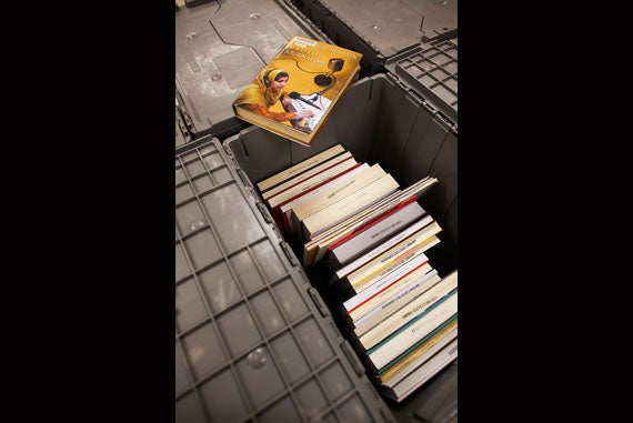 The Harvard Depository was built in 1986 to balance the burgeoning need for space on campus with the growing collections of Harvard’s library. A tote of incoming books waits to be processed.