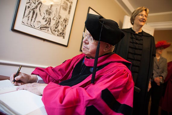 During Harvard's 362nd Commencement Boston Mayor Thomas M. Menino signed a guestbook in Massachusetts Hall while Harvard President Drew Faust looked on. File photo by Stephanie Mitchell/Harvard Staff Photographer