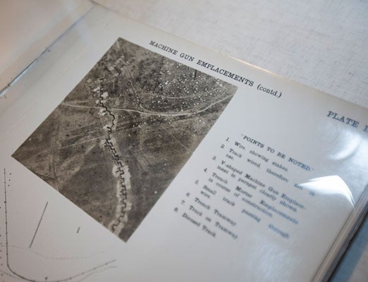 The new field of aerial photography was an invaluable tool to wartime mapmakers, but images could be difficult to read correctly. An original photo shows the extent of damage to the landscape; the resulting map below was adjusted for tilt, scale, and angle. Kris Snibbe/Harvard Staff Photographer