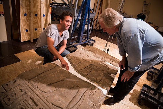 Aja and Deputy Museum Director Joseph A. Greene (right) discuss the repair of the museum’s largest ancient piece, a sandstone relief from Pylon IV of Karnak Temple. Century-old concrete had weakened.