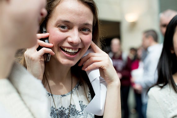 Katherine Schiavoni calls her father to give him the good news that she's going to Massachusetts General Hospital. Photo by Rose Lincoln/Harvard Staff Photographer