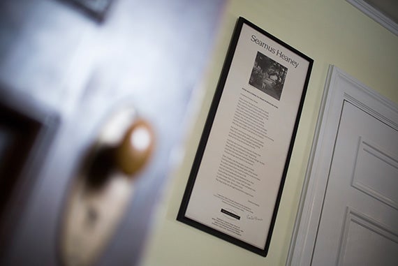 Framed broadsides of Seamus Heaney’s poems cover the walls of the suite in Adams House.