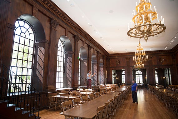 The majestic dining hall was part of the pre-student tour. Russ Porter (left), administrative dean for science, was shown around by Merle Bicknell, assistant dean for FAS physical resources. Kris Snibbe/Harvard Staff Photographer