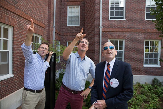 A tour of the newly renovated Dunster House was conducted on Friday with Dean of Student Life Stephen Lassonde (from left), Administrative Dean for Science Russ Porter, and Michael Patrick Burke, registrar of the Faculty of Arts and Sciences. Kris Snibbe/Harvard Staff Photographer