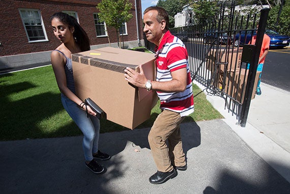 Saturday's move-in day at Dunster had Shivangi Parmar '17 (left) getting a helping hand from her father, Kulbir Parmar.