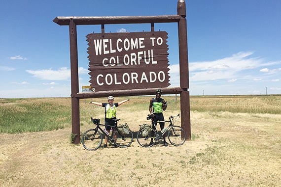 July 10:  Harvard junior Francesca Childs (left) and senior Tola Omilana celebrate as they cross the Colorado border. It was yet another leg in the journey taking them from D.C. to San Francisco. 