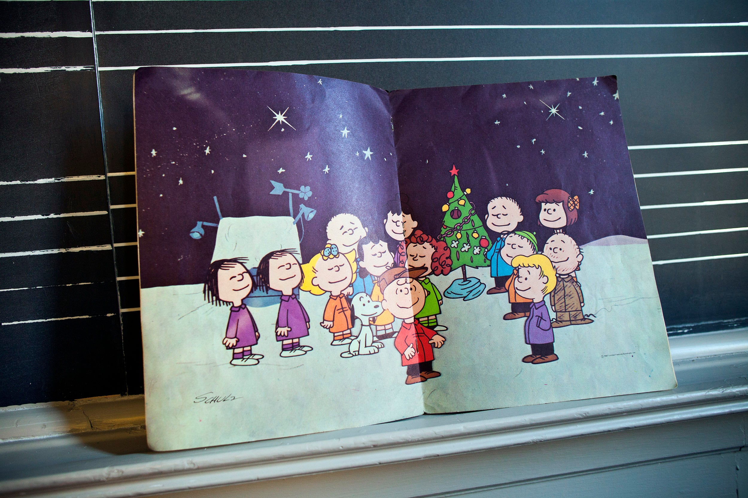 Detail of Vince Guaraldi's sheet music illustrated with "Peanuts" characters.