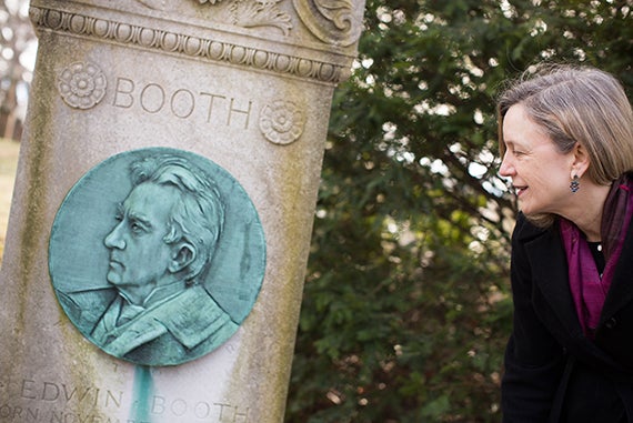 Melissa Banta looks at the monument for Edwin Booth, brother of John Wilkes Booth. 