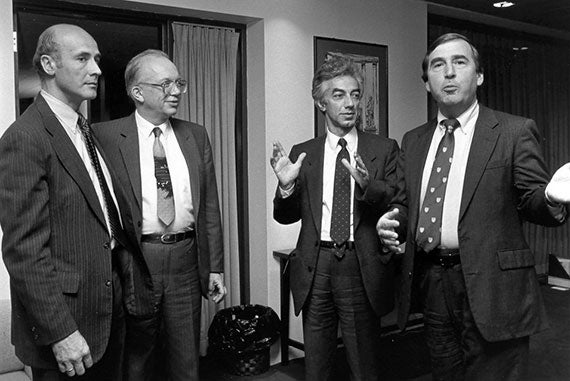 Joseph Nye (from left), director of the Belfer Center for Science and International Affairs; Sergei Khrushchev, son of Soviet Chairman Nikita Khrushchev; Sergo Mikoyan, son of Soviet First Deputy Premier Anastas Mikoyan; and Graham Allison, dean of the Harvard Kennedy School, at dinner before the JFK Jr. Forum discussion "On the Brink: A Soviet Re-examination of the Cuban Missile Crisis," Feb. 15, 1989. Photo by Martha Stewart