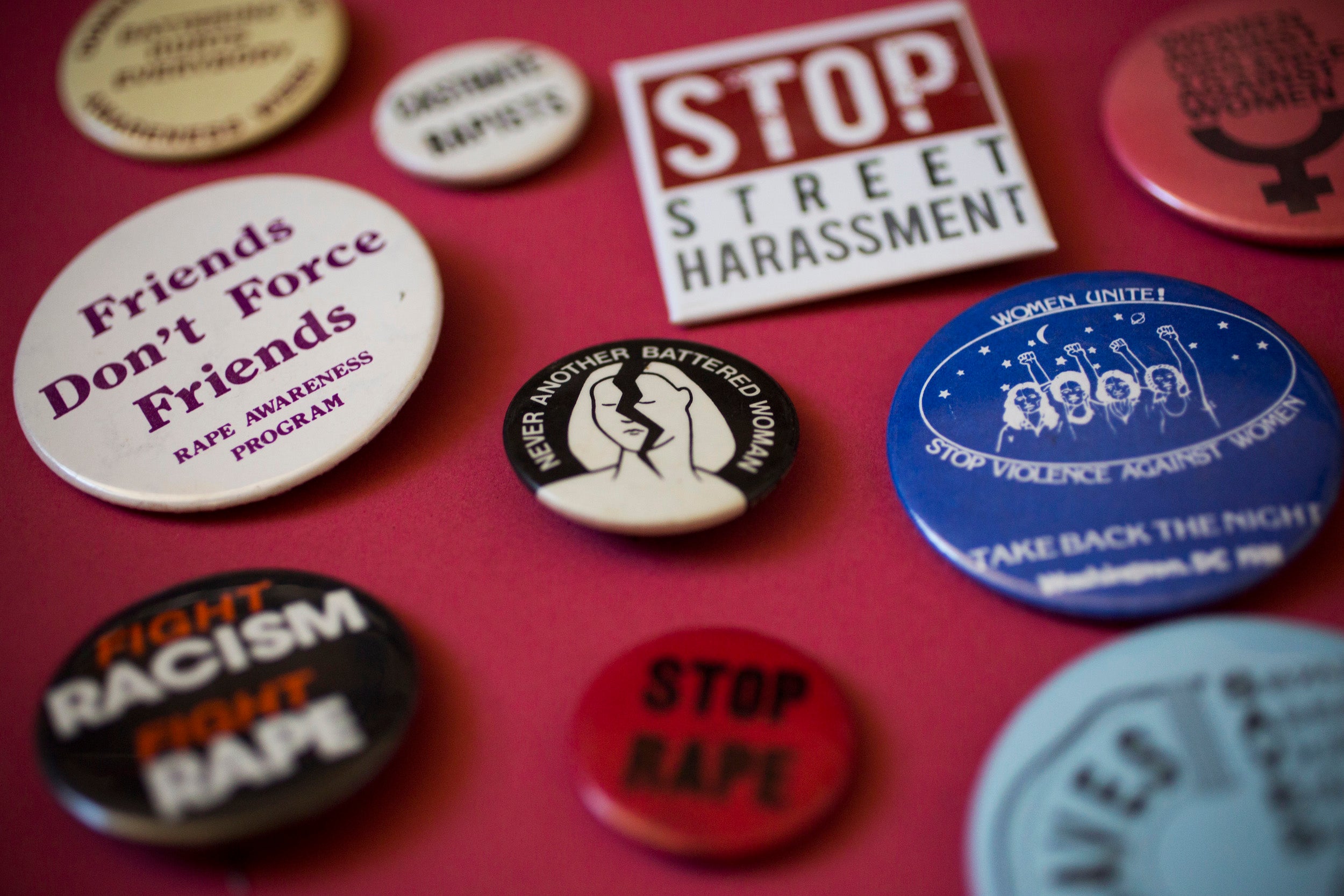 Stop Violence Against Women buttons.
