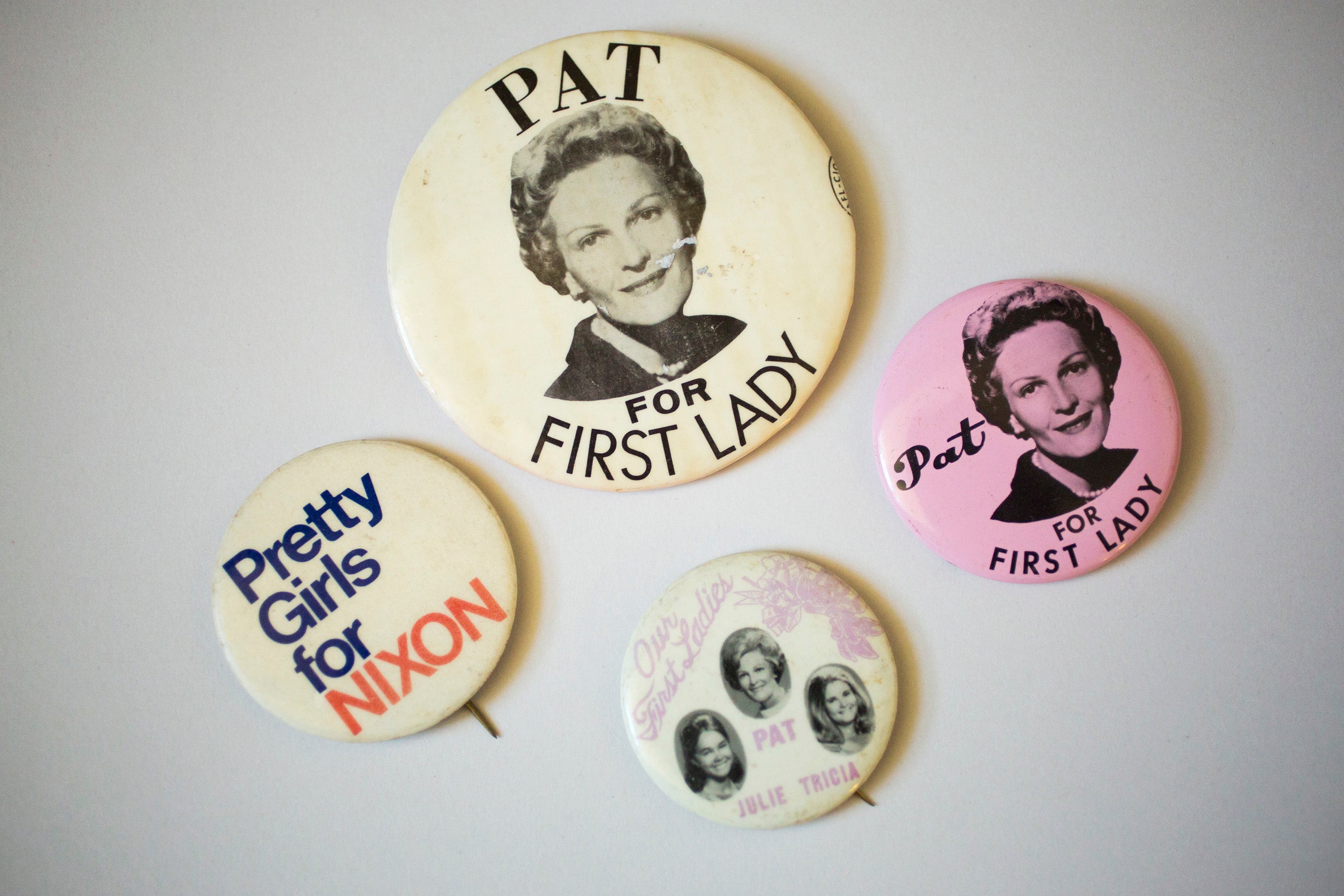 Pat, Julie, and Tricia Nixon had their own supporters and buttons.