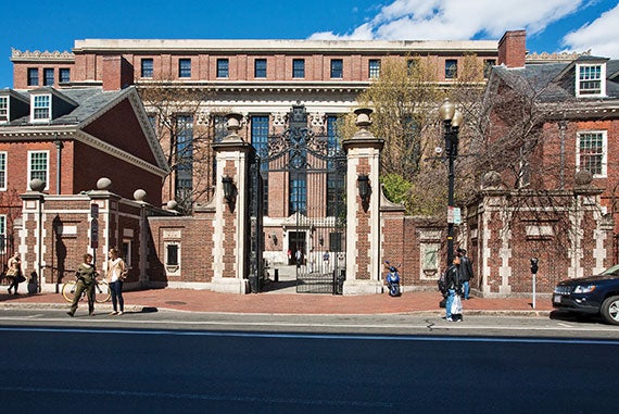 The towering Morgan Gate joins with dormitories such as Wigglesworth Hall to form a harmonious perimeter around Harvard Yard. Widener Library is in the background. Image credit: Ralph Lieberman