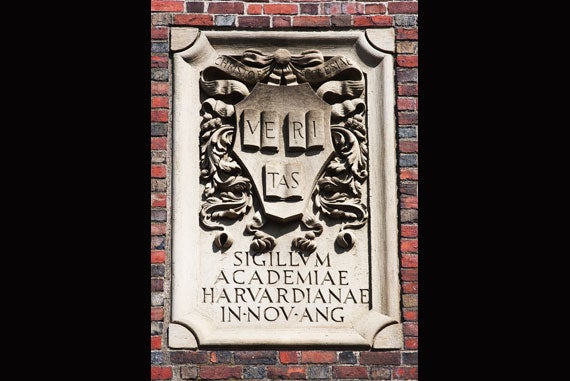 The Harvard shield, including the “Veritas” motto displayed on three open books, endows Johnston Gate with a sense of authority. Image credit: Ralph Lieberman