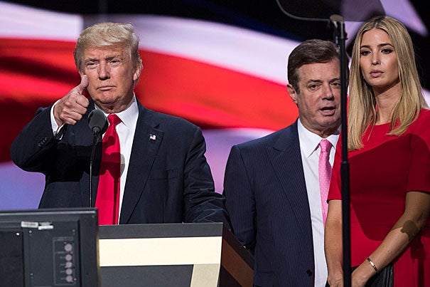 Federal charges have been brought against two former Trump advisers, including Paul Manafort (center). If evidence links Trump to criminal activity, Congress may have to consider impeachment. But as Harvard Professor Cass Sunstein points out, the Constitution sharply limits the category of impeachable offenses.
