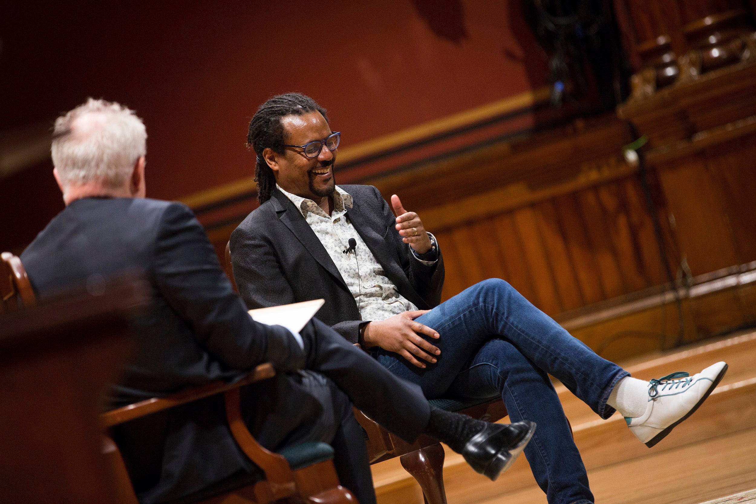Colson Whitehead laughs with John Lithgow