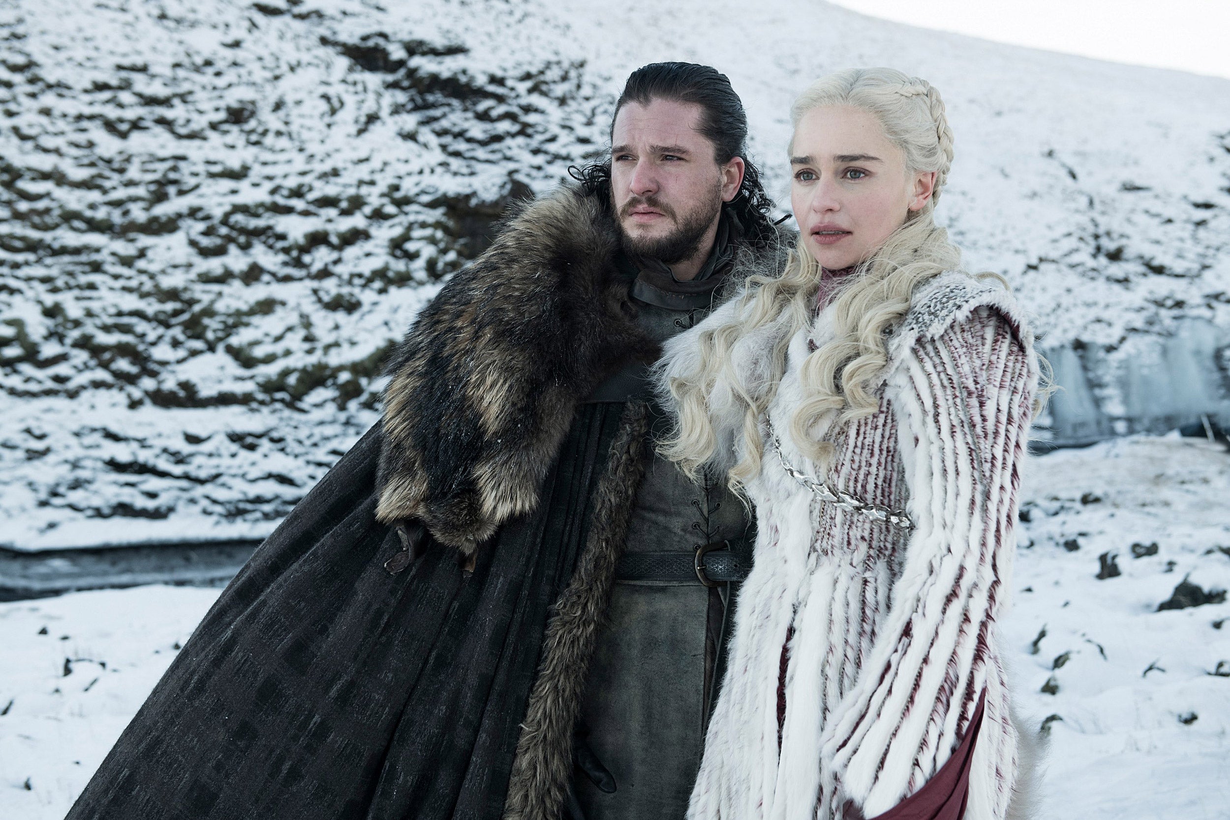 Kit Harington as Jon Snow and Emilia Clarke as Daenerys Targaryen.