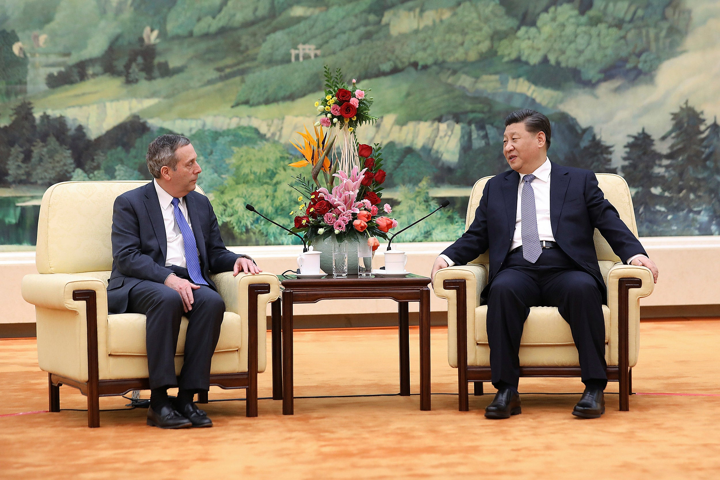 Harvard President Larry Bacow (left) meets with Chinese President Xi Jinping.