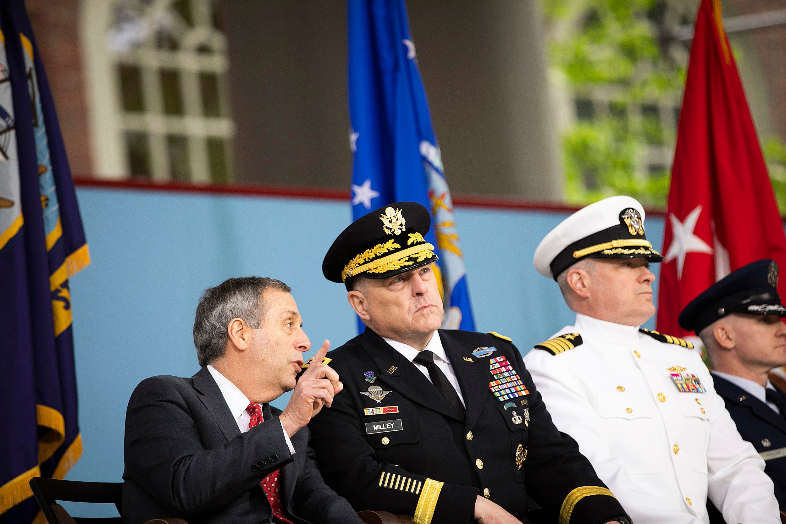 Harvard President Larry Bacow (left) speaks with General Mark A. Milley during there event.