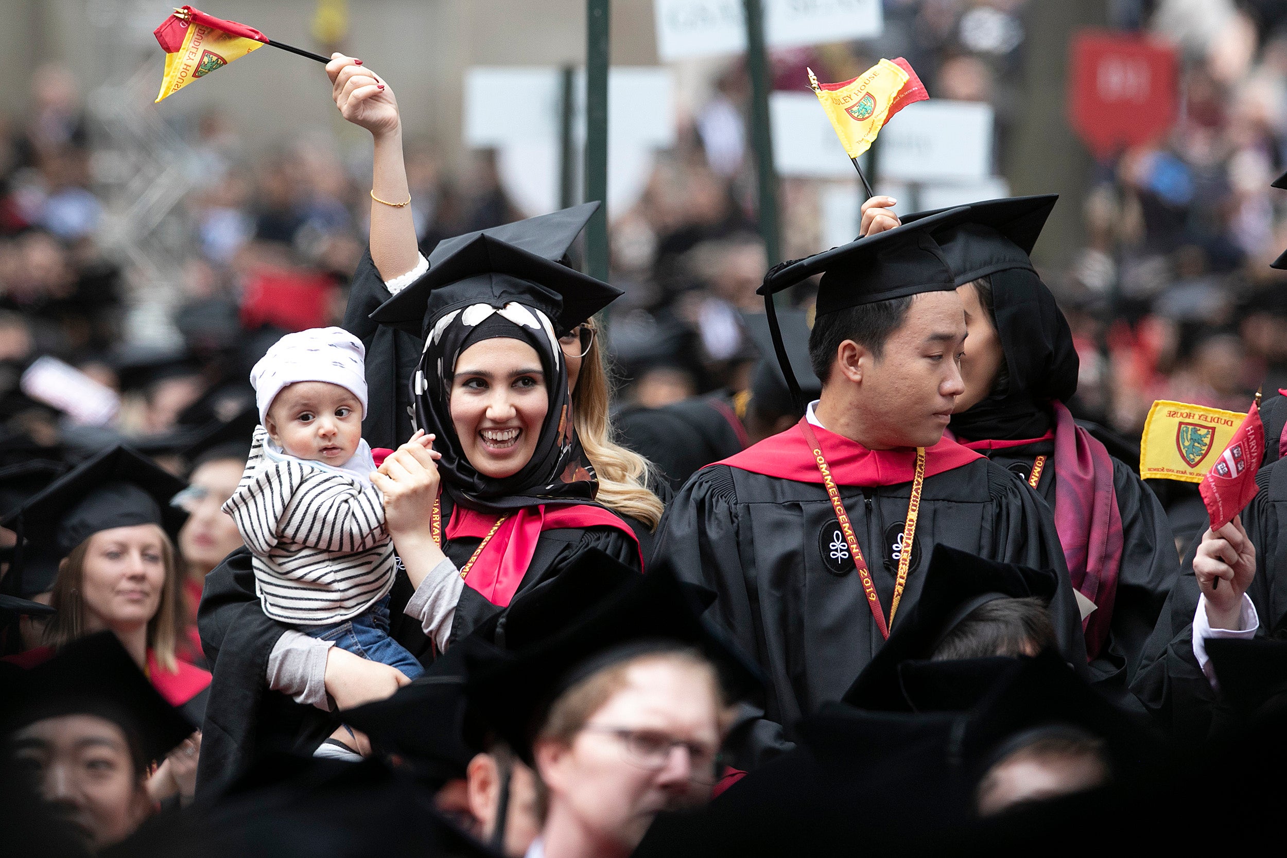 Khadijah Qamar celebrates the conferral of GSAS degrees with her 6-month old, Abdul Latin.