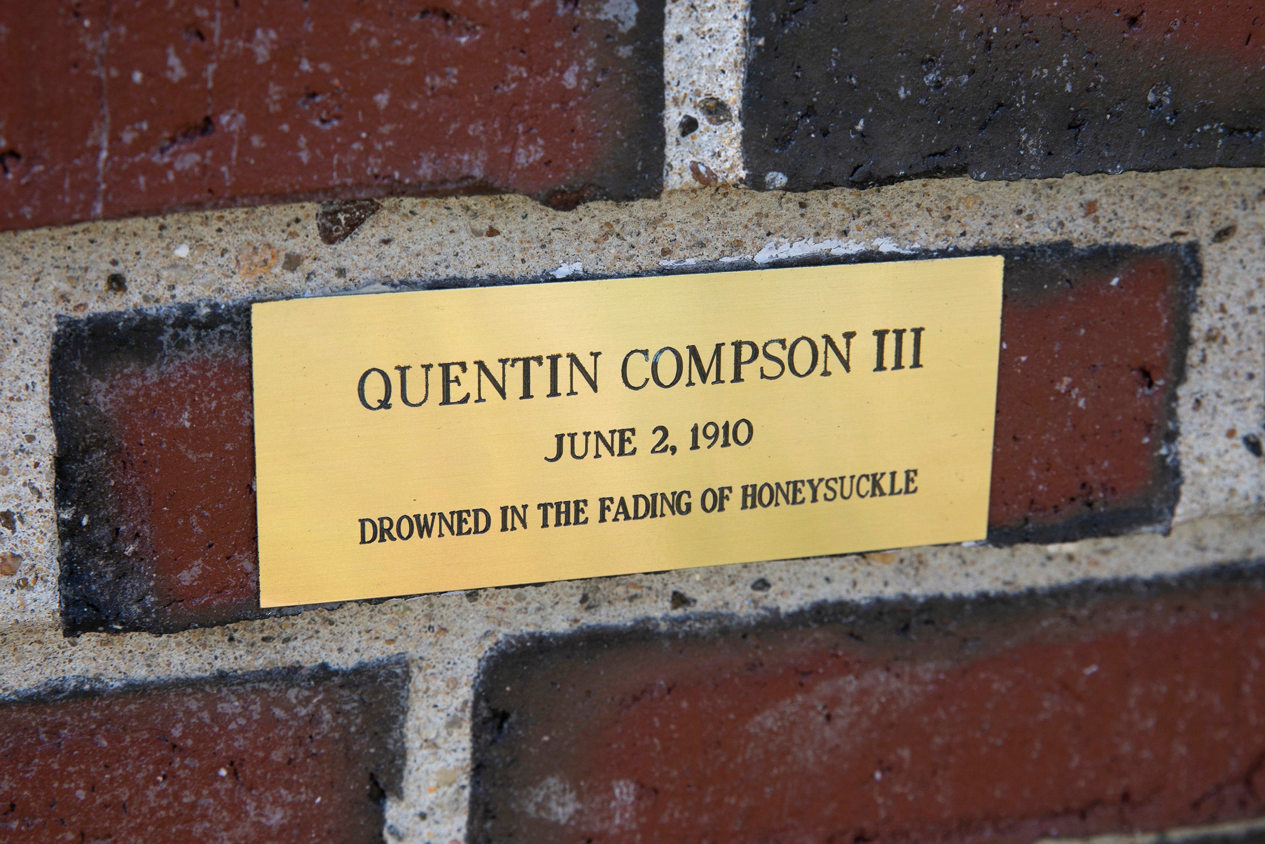 Plaque on a brick wall