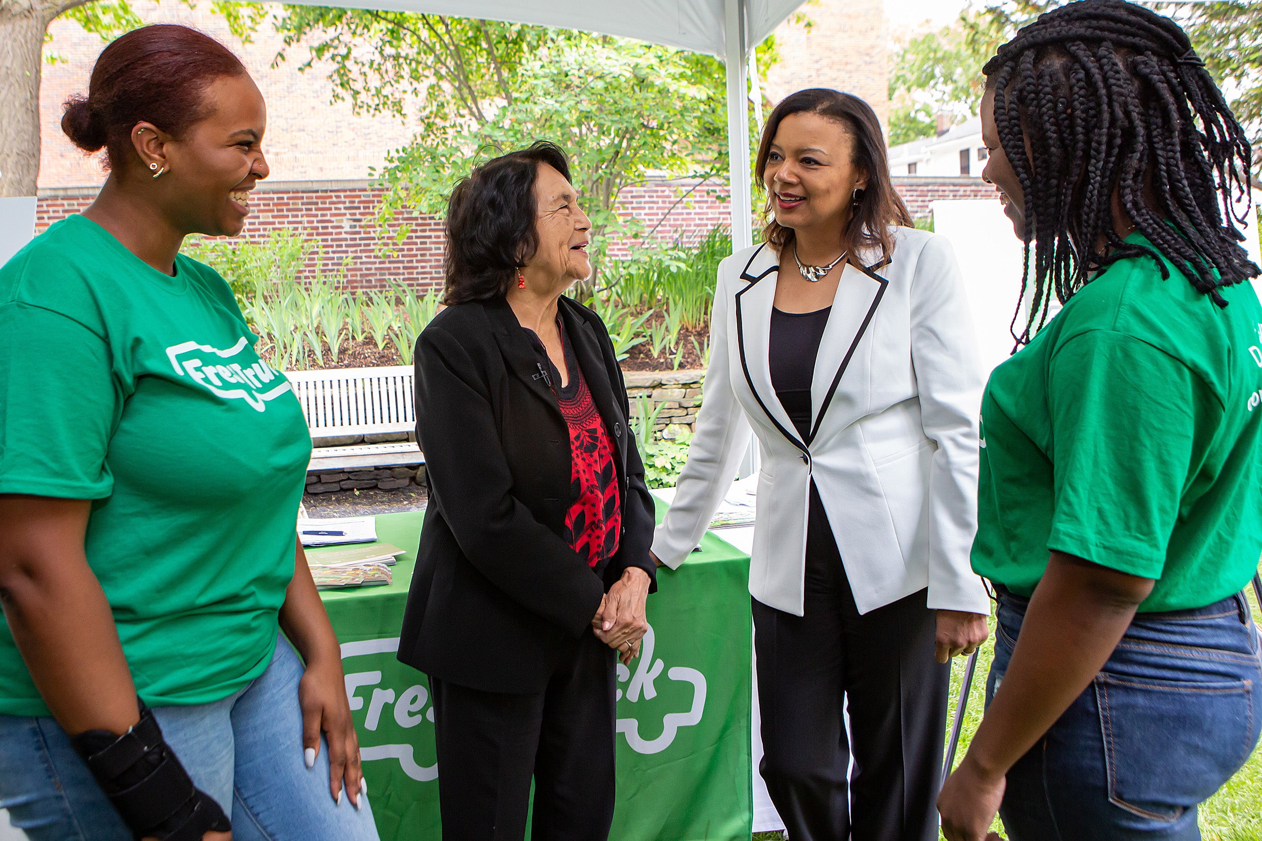 Dolores Huerta and Radcliffe Dean Tomiko Brown-Nagin are flanked by Fresh Truck's Raya Jackson (left) and Markiesha Duverneau.