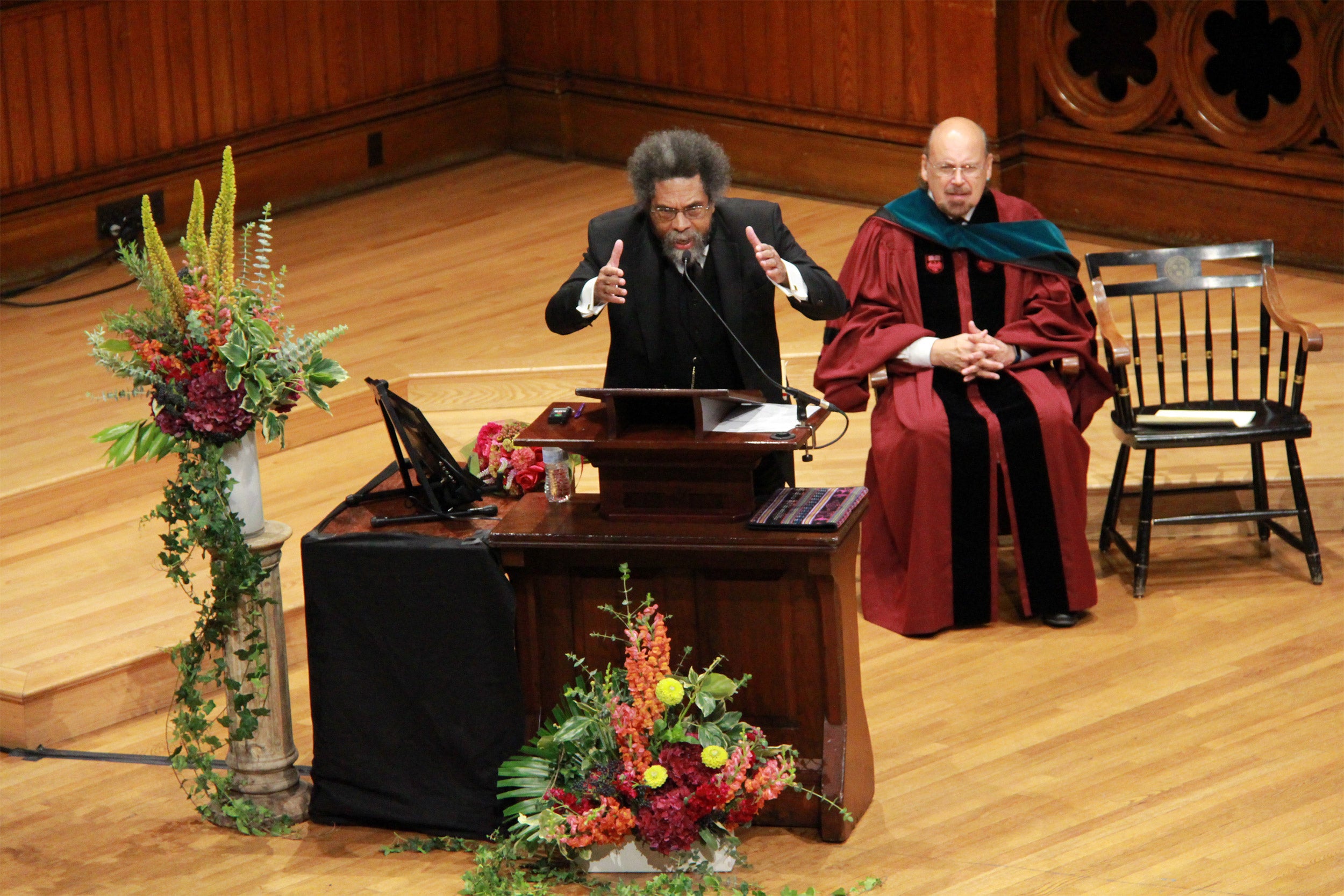 Cornel West at the podium.
