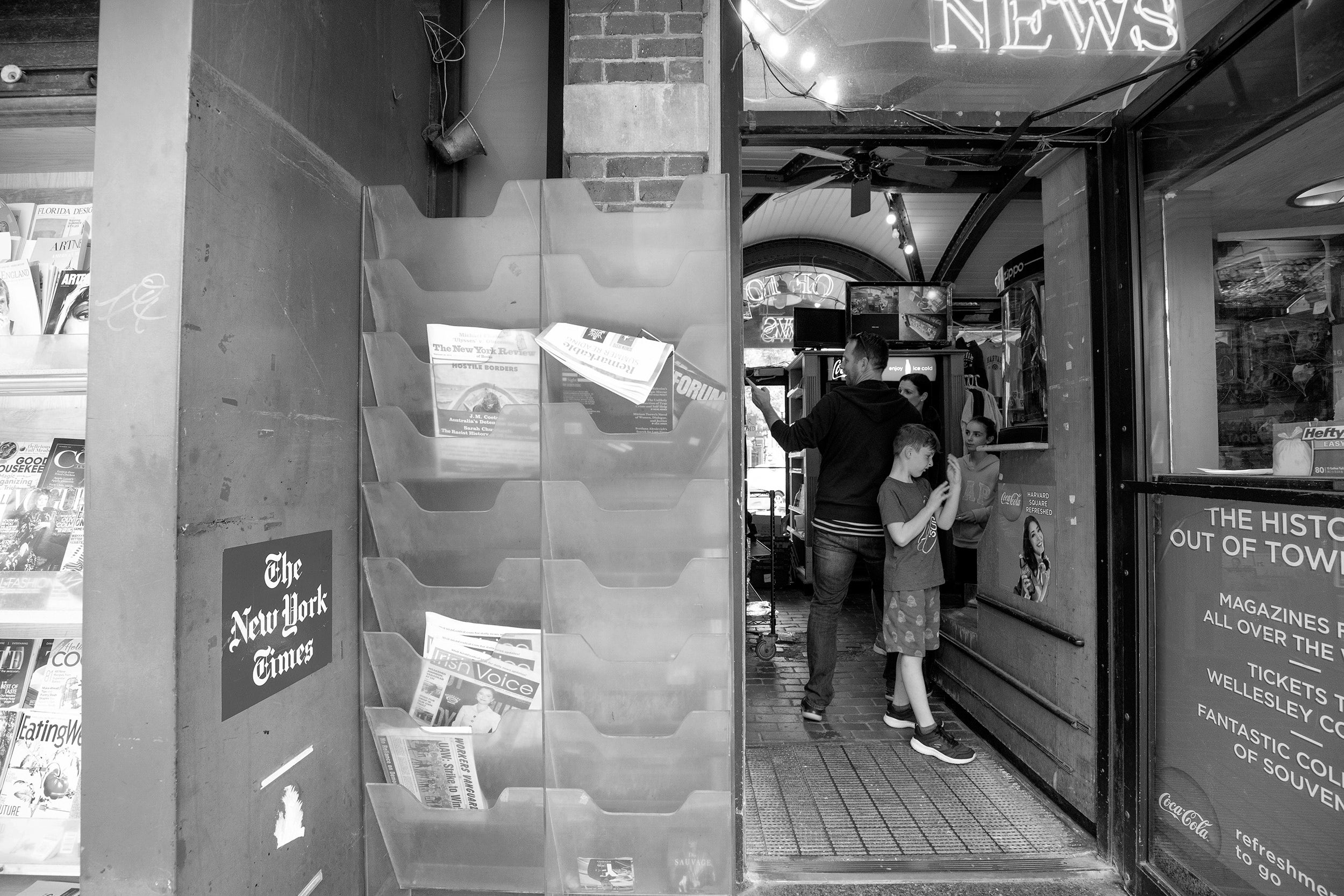 Looking inside the newsstand.