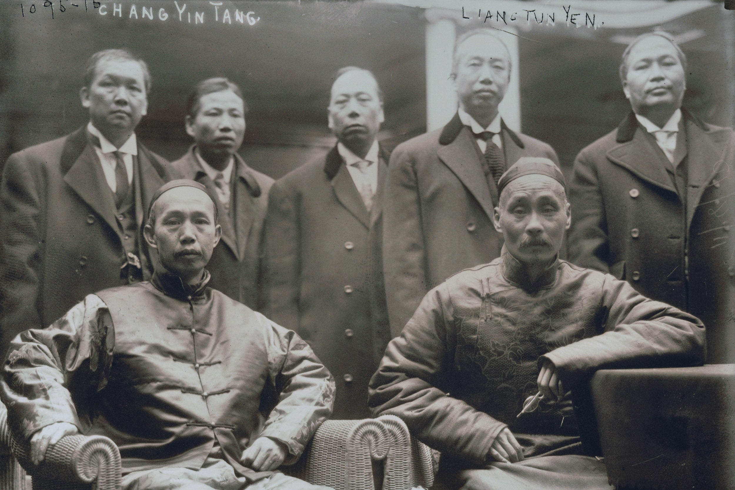 A photo of several Chinese men.