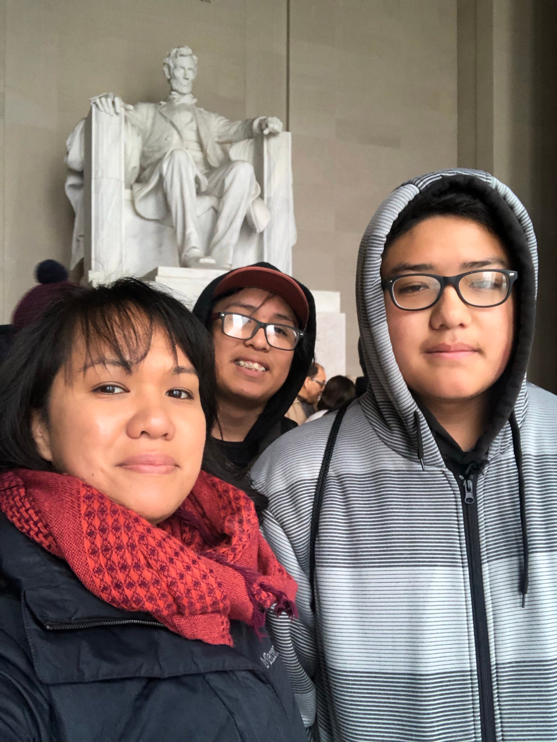 Heidi Brandow with her two sons Kian, 14, center, and Mateo, 15.