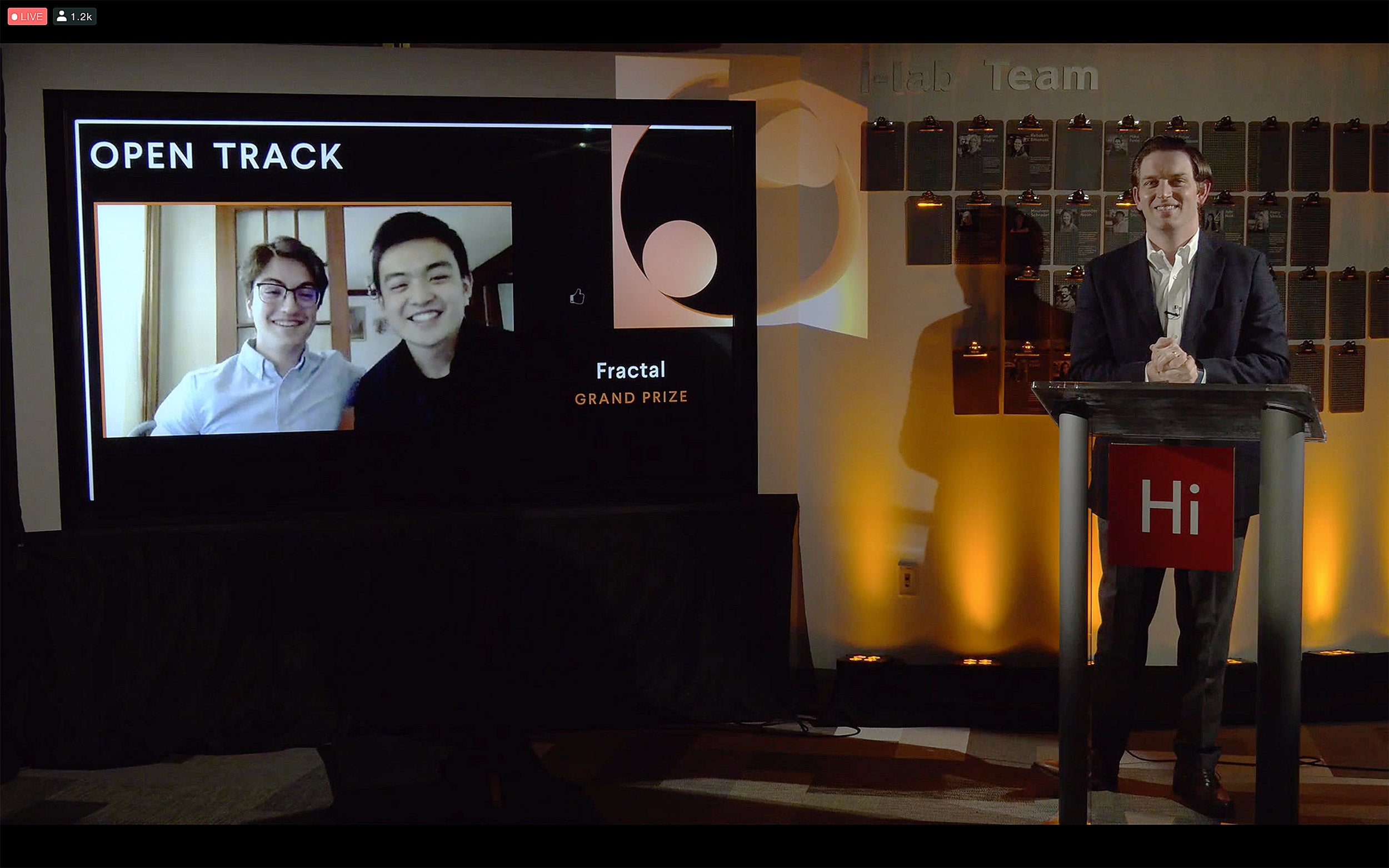 • Fractal co-founders Philippe Noel Ming Ying celebrate Open Track grand prize with team.