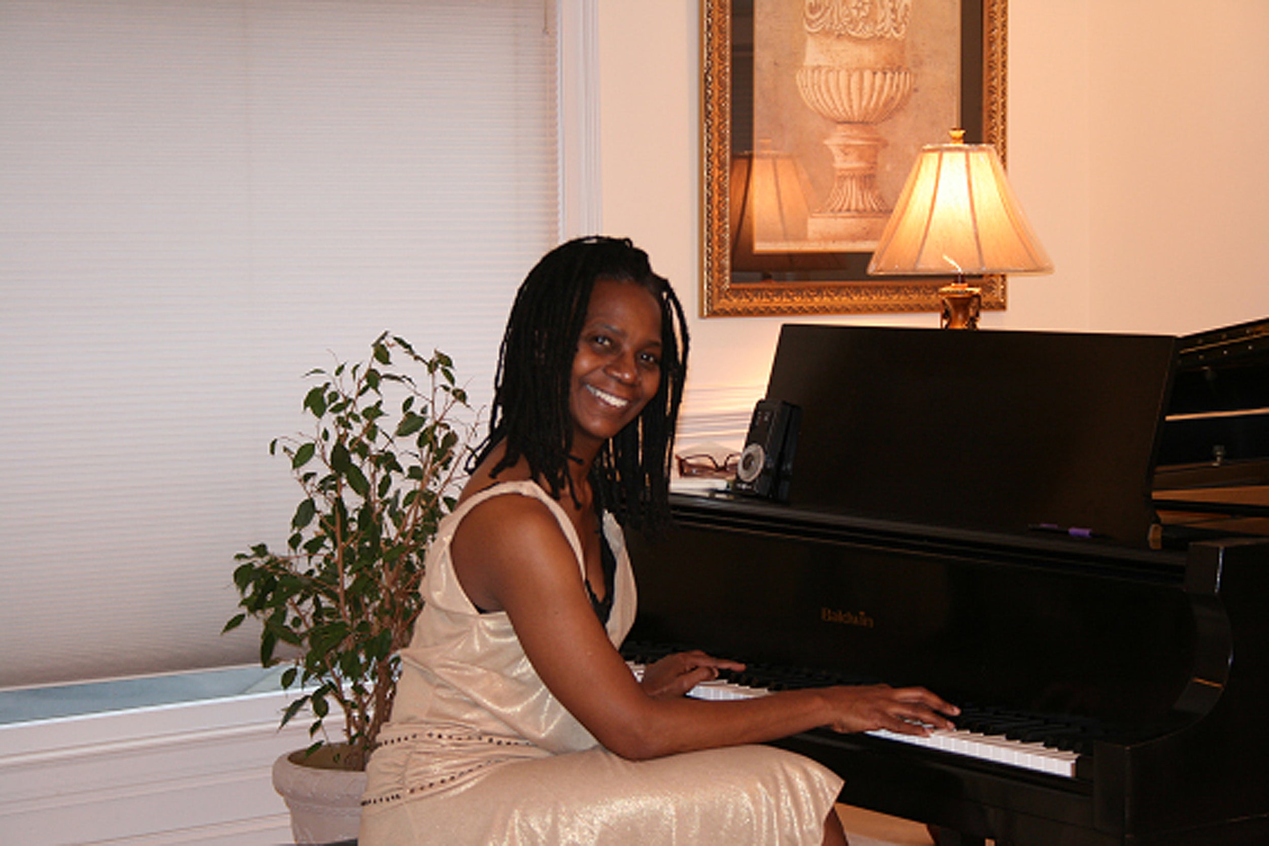 Deborah Brown playing piano.