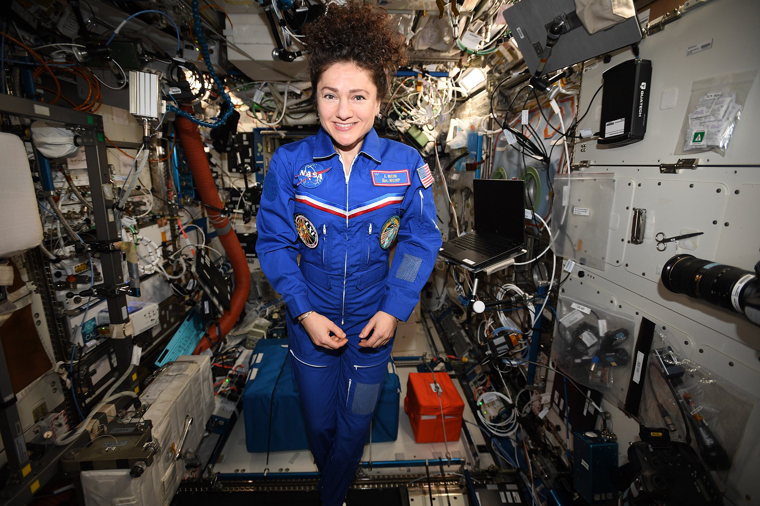 Jessica Meir in space station.