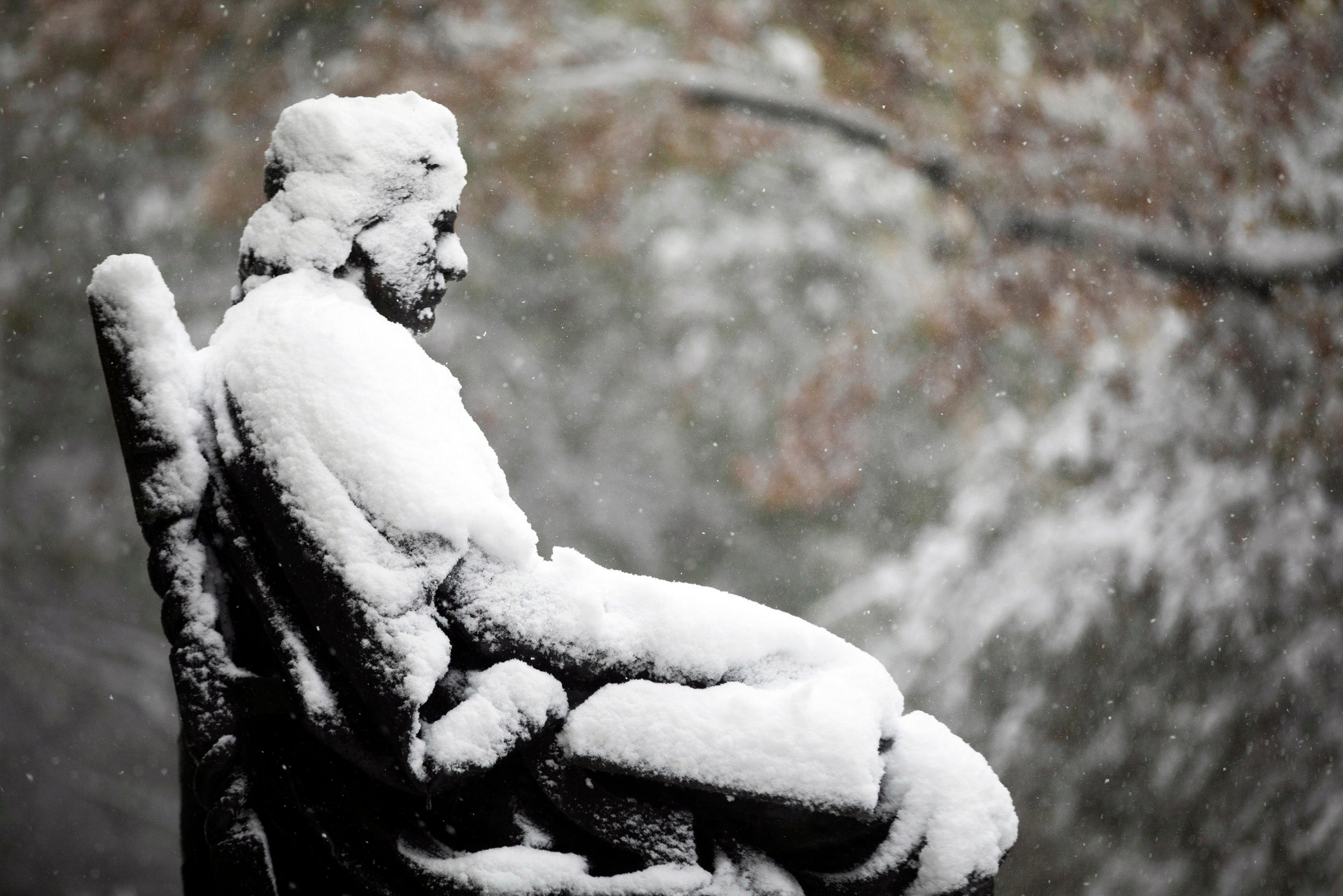 John Harvard in snow.