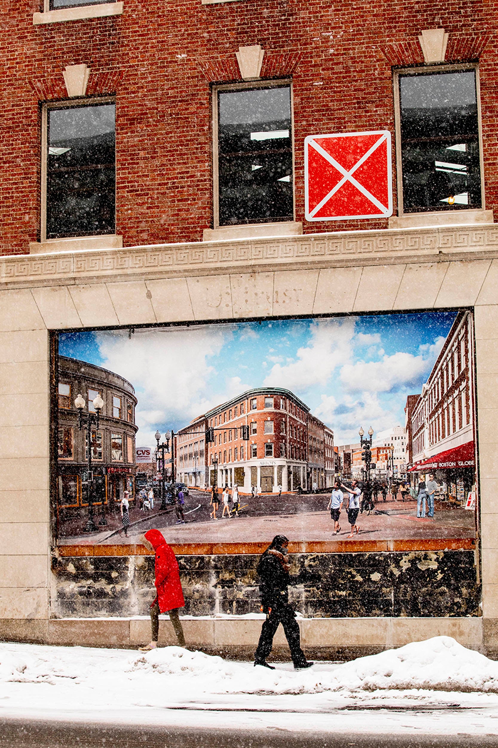 Bundled up pedestrians walk past an artist's rendering of the Abbot building in Harvard Square.