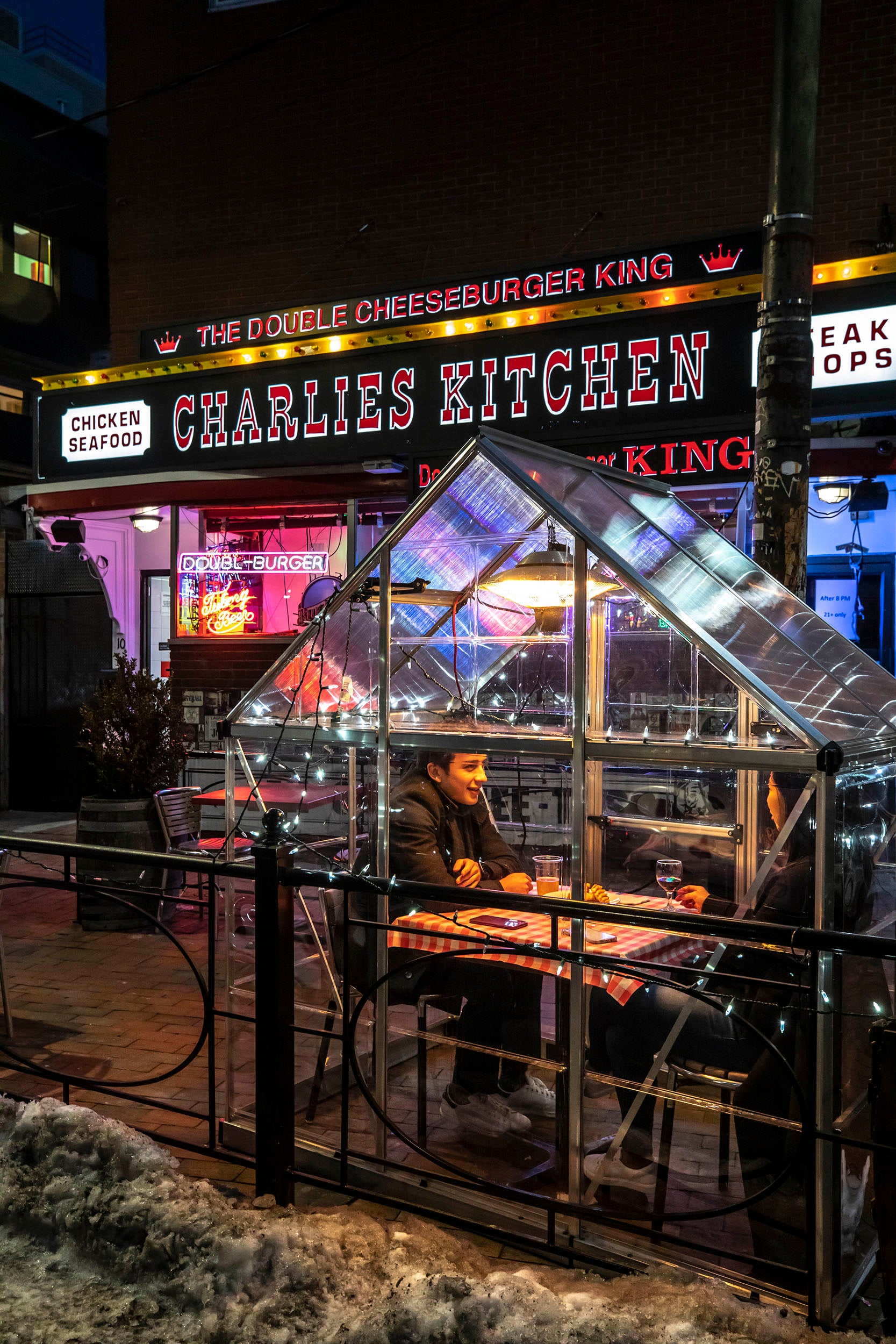 An outdoor pod is pictured on Eliot Street outside Charlie's Kitchen.
