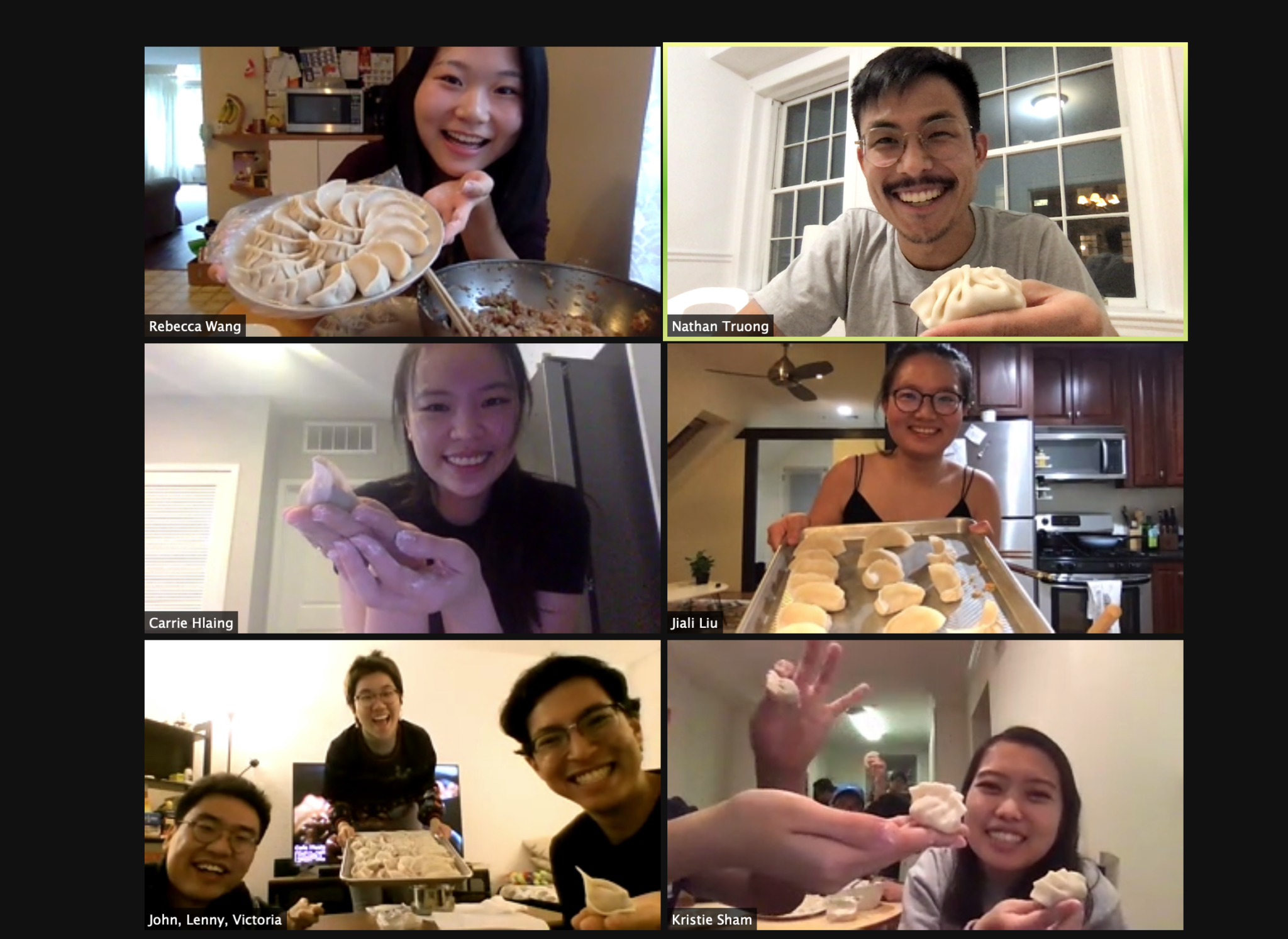 students showing their dumplings on a zoom call