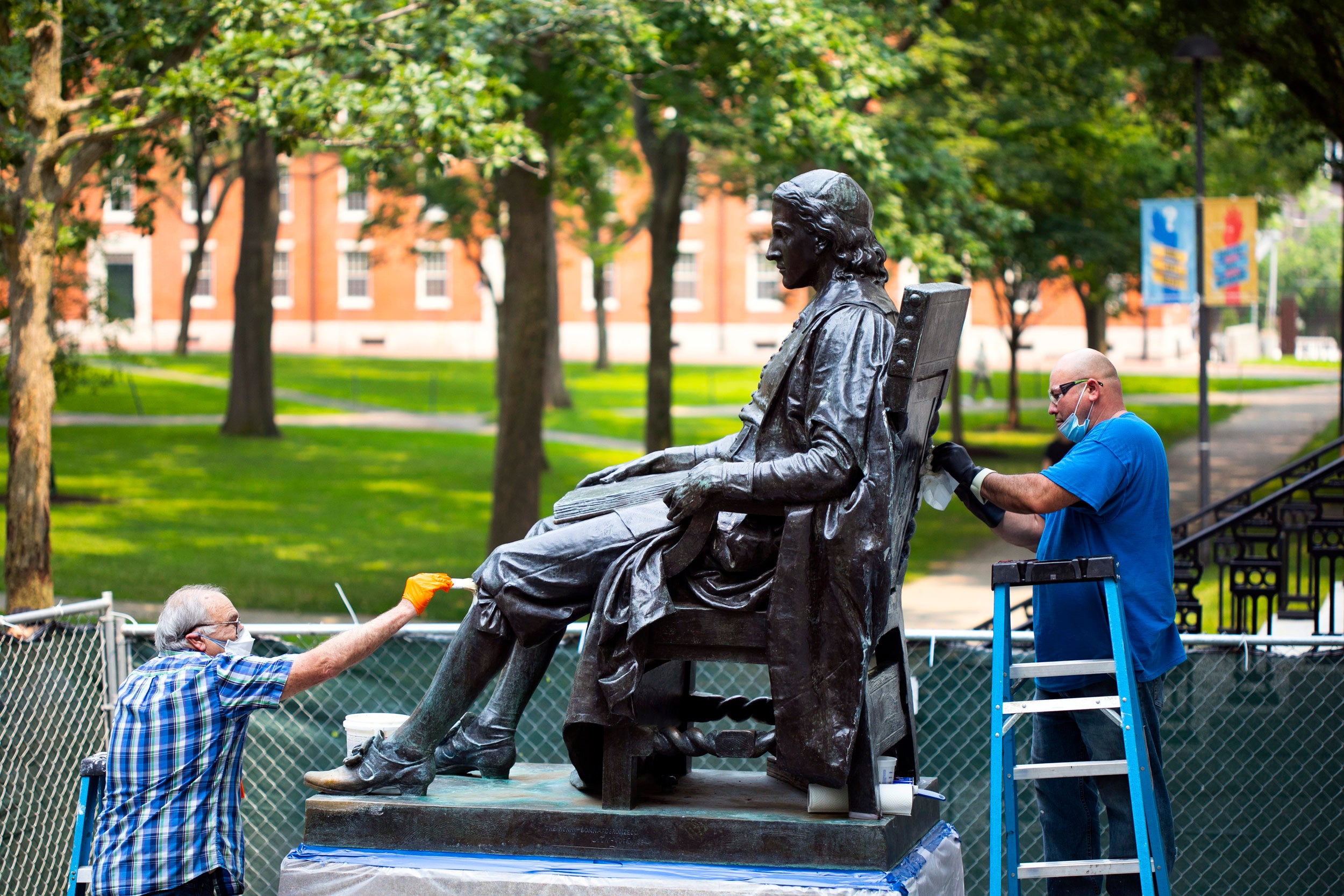 John Harvard statue restoration.