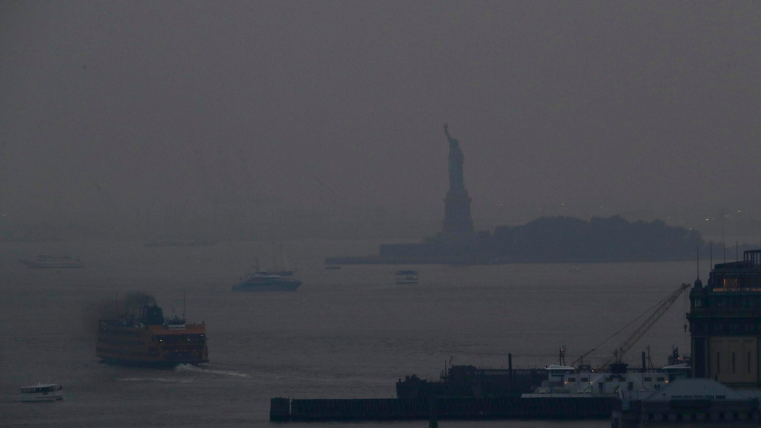 Statue of Liberty shrouded in smoke from wildfires on West Coast.