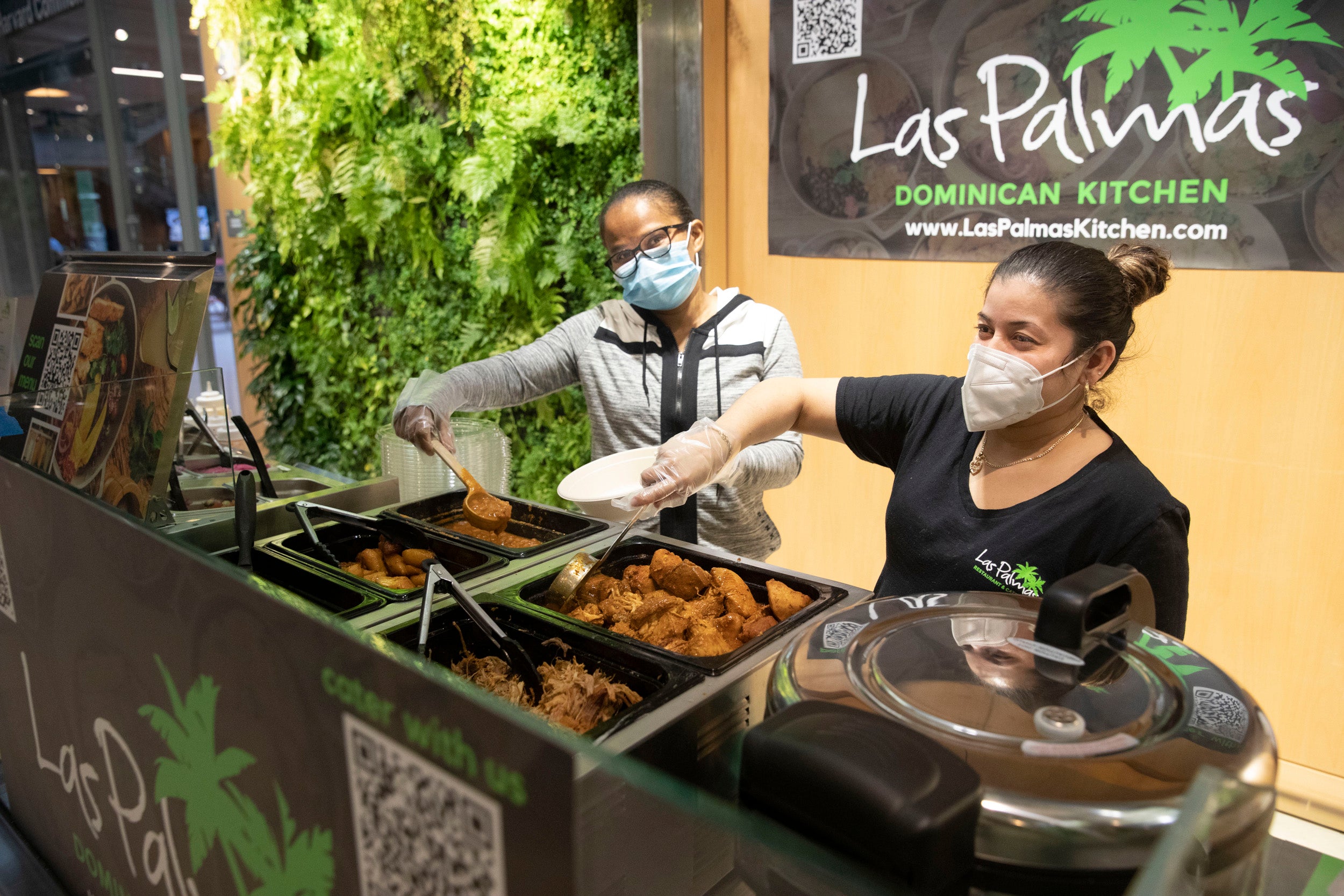 Maritza Hernandez (left) and Delores Martinez showcase Las Palmas’ featured fare