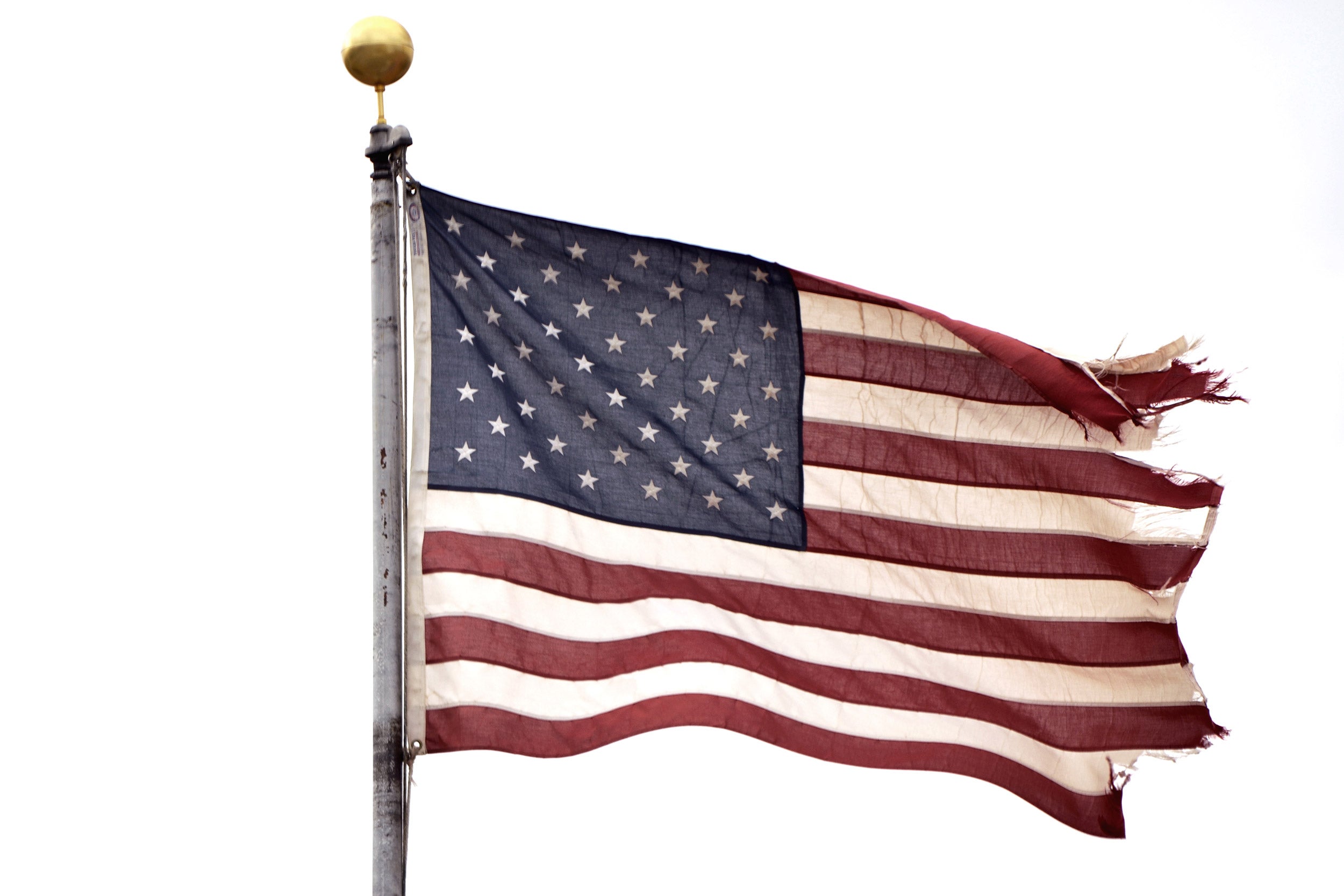 Frayed U.S. flag.