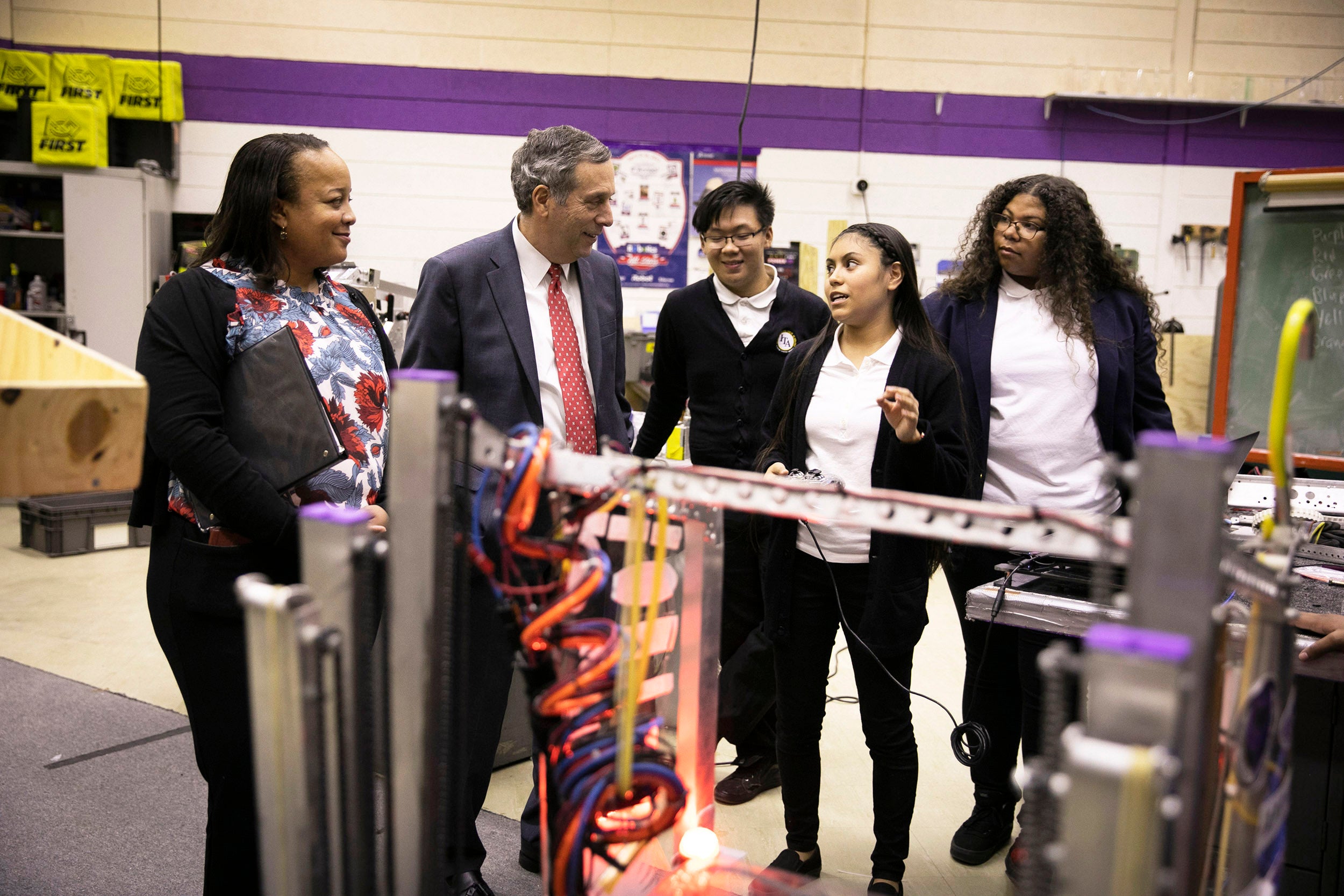 President Larry Bacow and Dean Bridget Terry Long visit the International Technology Academy in Pontiac, Michigan.