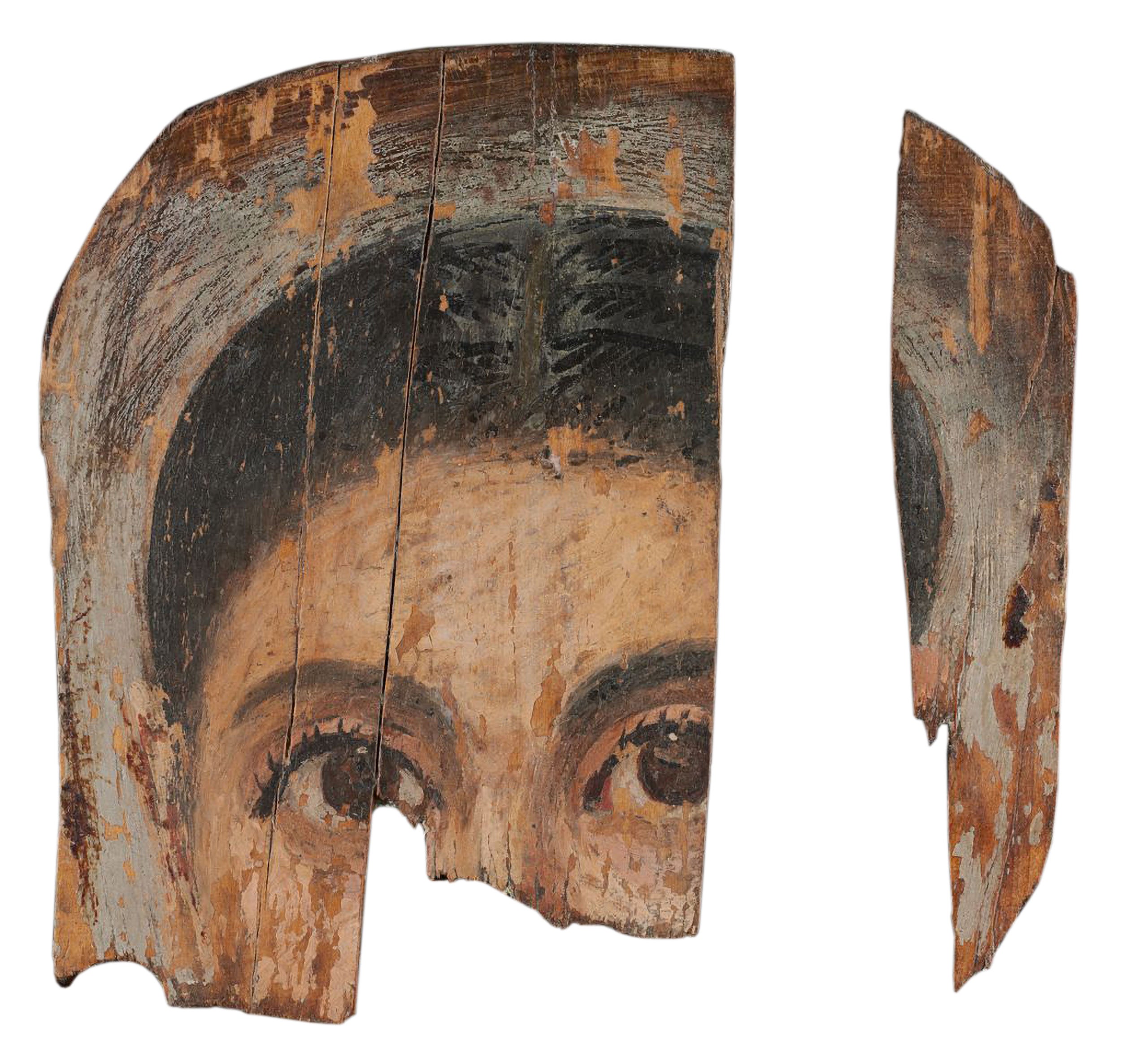 Fragmentary portrait of a woman from Roman Egypt with lower half of face and much of right side of face missing. with large brown eyes that are delicately rimmed with thick lashes. The figure's black-brown hair is parted in the center and pulled back from her face with visible rows of herring-bone pattern painted in thick, dark pigment to suggest plaited rows.