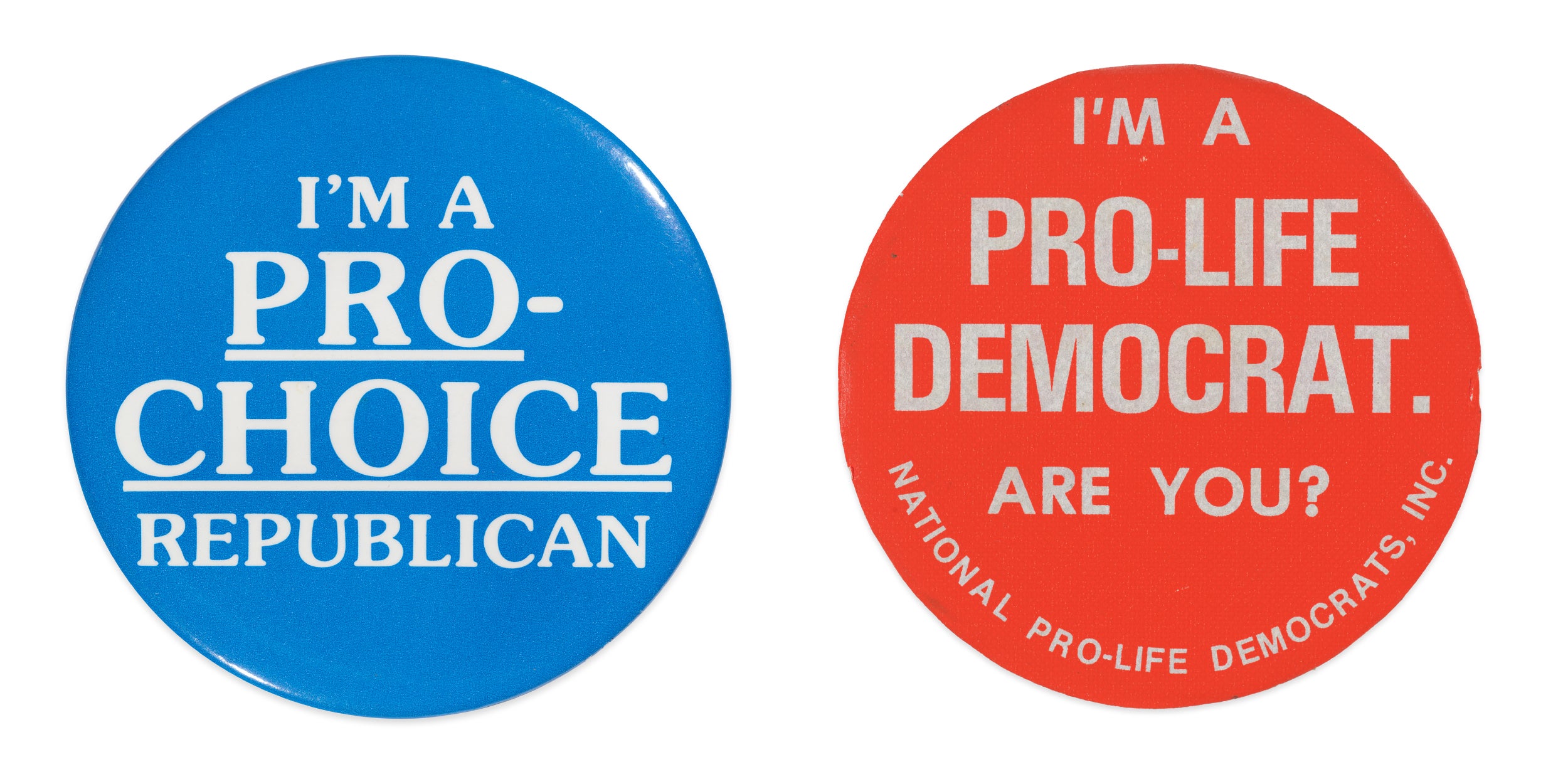 Two buttons from exhibition. One says "I'm a pro-choice Republican" and the other reads, "I'm a pro-choice Democrat. Are you?"