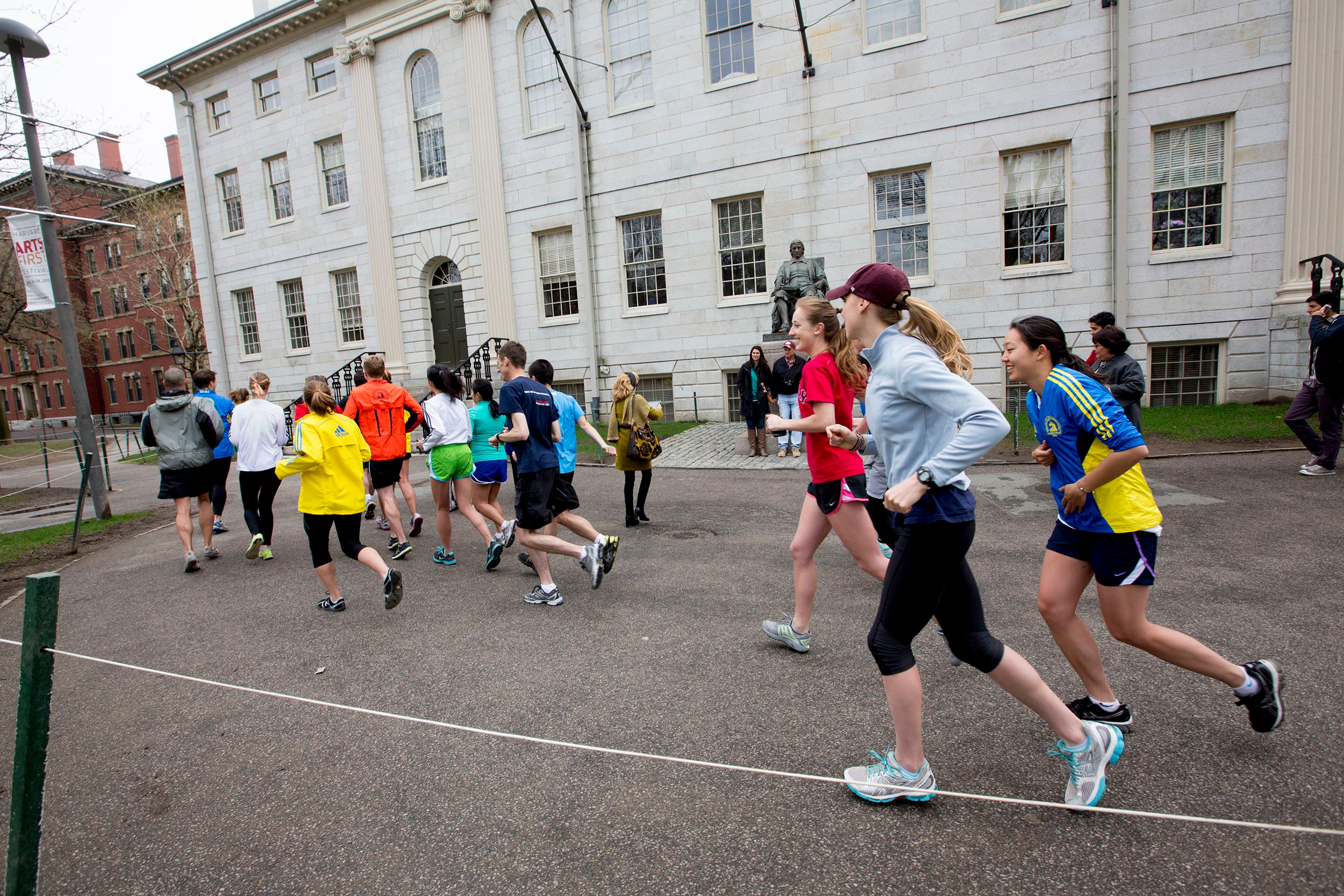 Runners in Harvard Yard.