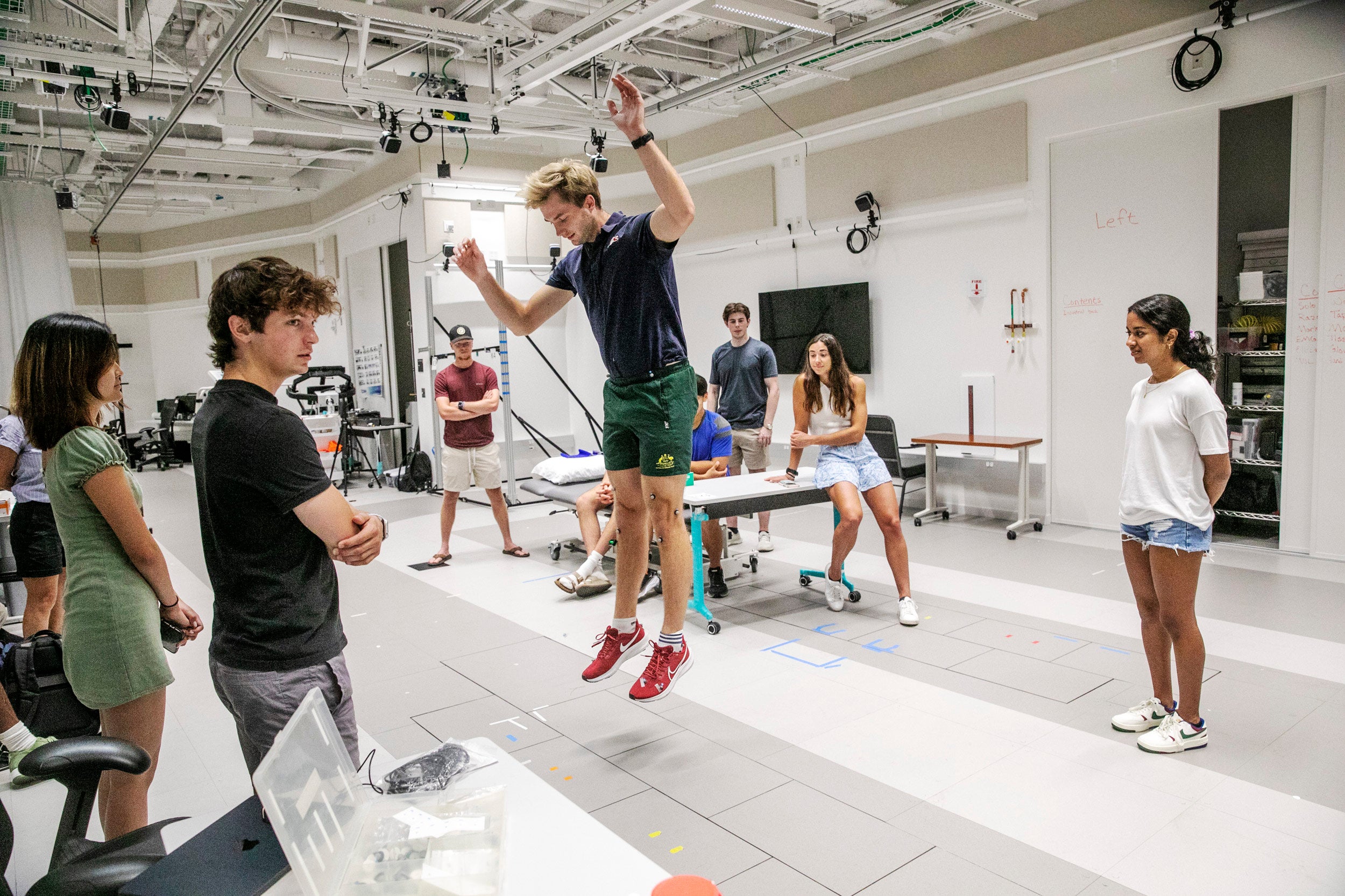 Benjamin Zeisberg ’23 jumps and generates a readout of his muscle movement and energy expenditure.