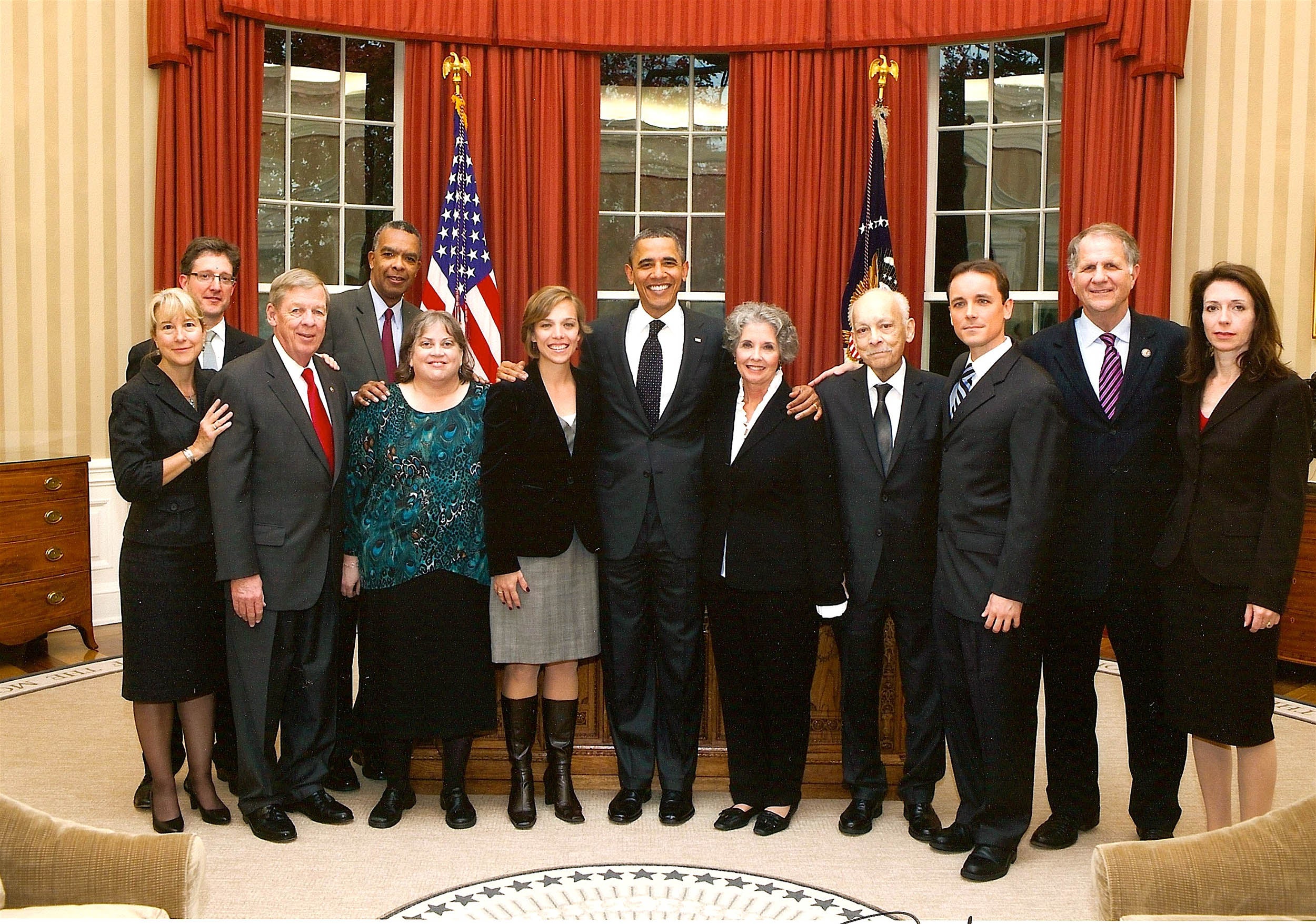 Karestan Koenen in the White House with President Obama and others after passage of Kate Puzey Peace Corps Volunteer Protection Act.