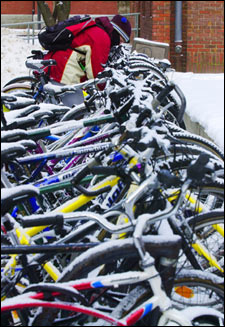 Snow-covered bikes