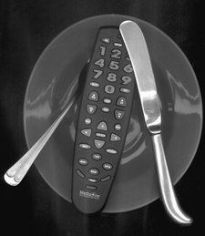 photo illustration of a tv remote served up on a dinner